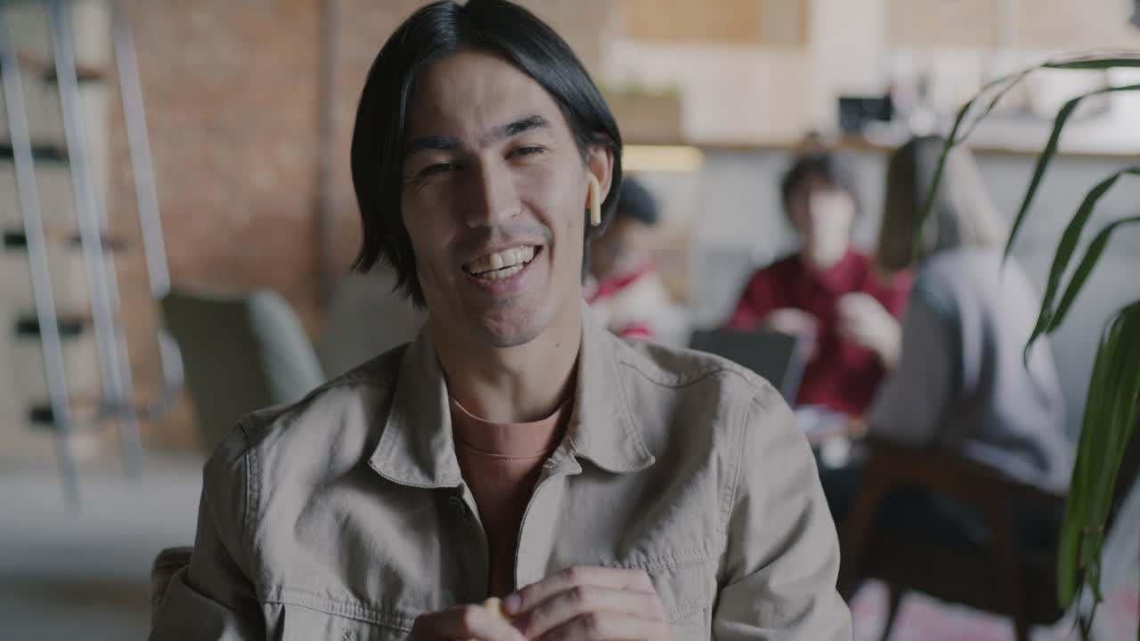 Happy Man in a Modern Office Setting