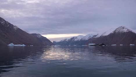 summer in arctic circle, icebergs and fjord on svalbard, north norwegian territory