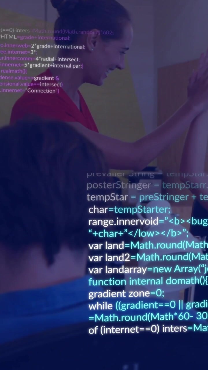 Vertical video: Coworker leaning in and pointing at screen, cheering after code overlay showing fix