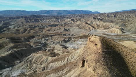 tabernas desert, scenic nature landscape in almeria, andalusia, spain - aerial 4k pan right