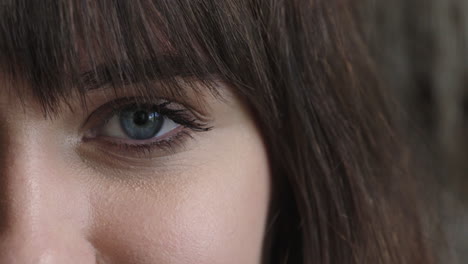 close-up-woman-blue-eye-blinking-looking-at-camera