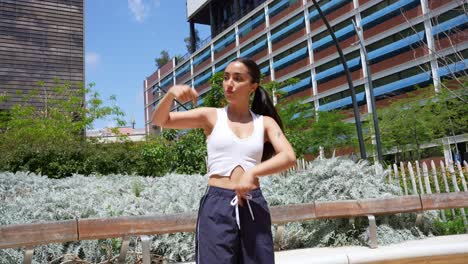 woman dancing in urban park