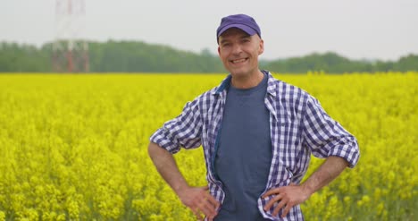 farmer examining agriculture field on farm 10