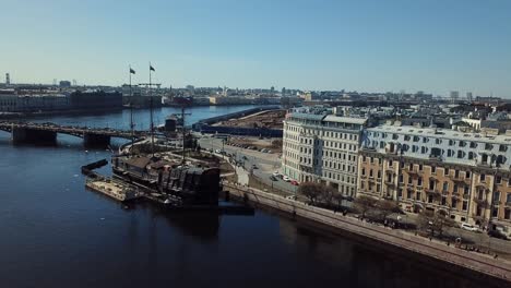 st. petersburg riverfront with historic ship