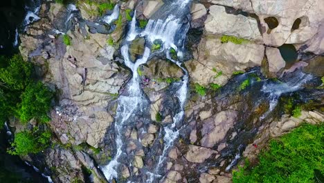 Birds-eye-aerial-view-over-the-Ai-Beling-Waterfalls-on-Sumbawa-Indonesia