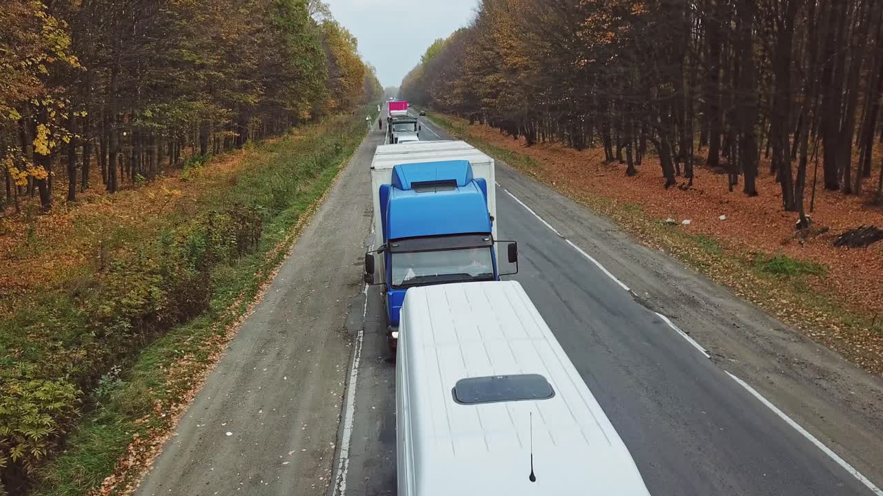 Road works during construction. Aerial view of traffic on the freeway with cars and trucks
