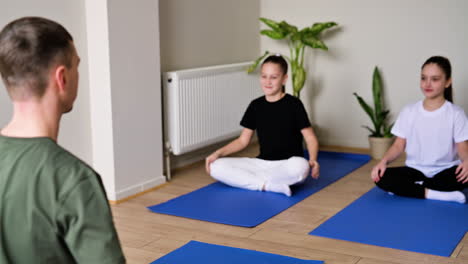 kids practising yoga