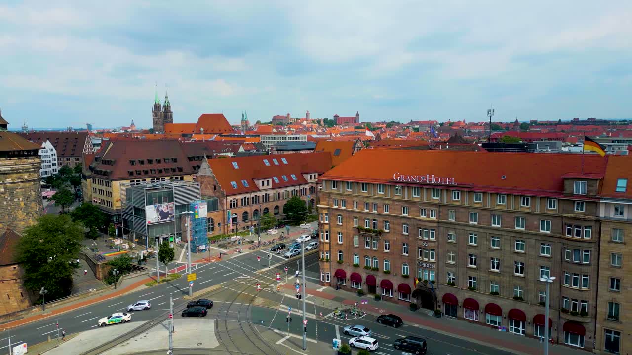 4K Aerial Drone Video of Traffic in Front of the Grand Hotel and Women's Gate Tower in Downtown Nurnberg, Germany