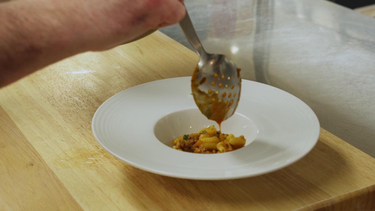 prep kitchen plating food ready to be served to guest. Restaurant