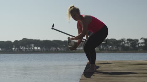 female rowing team training on a river