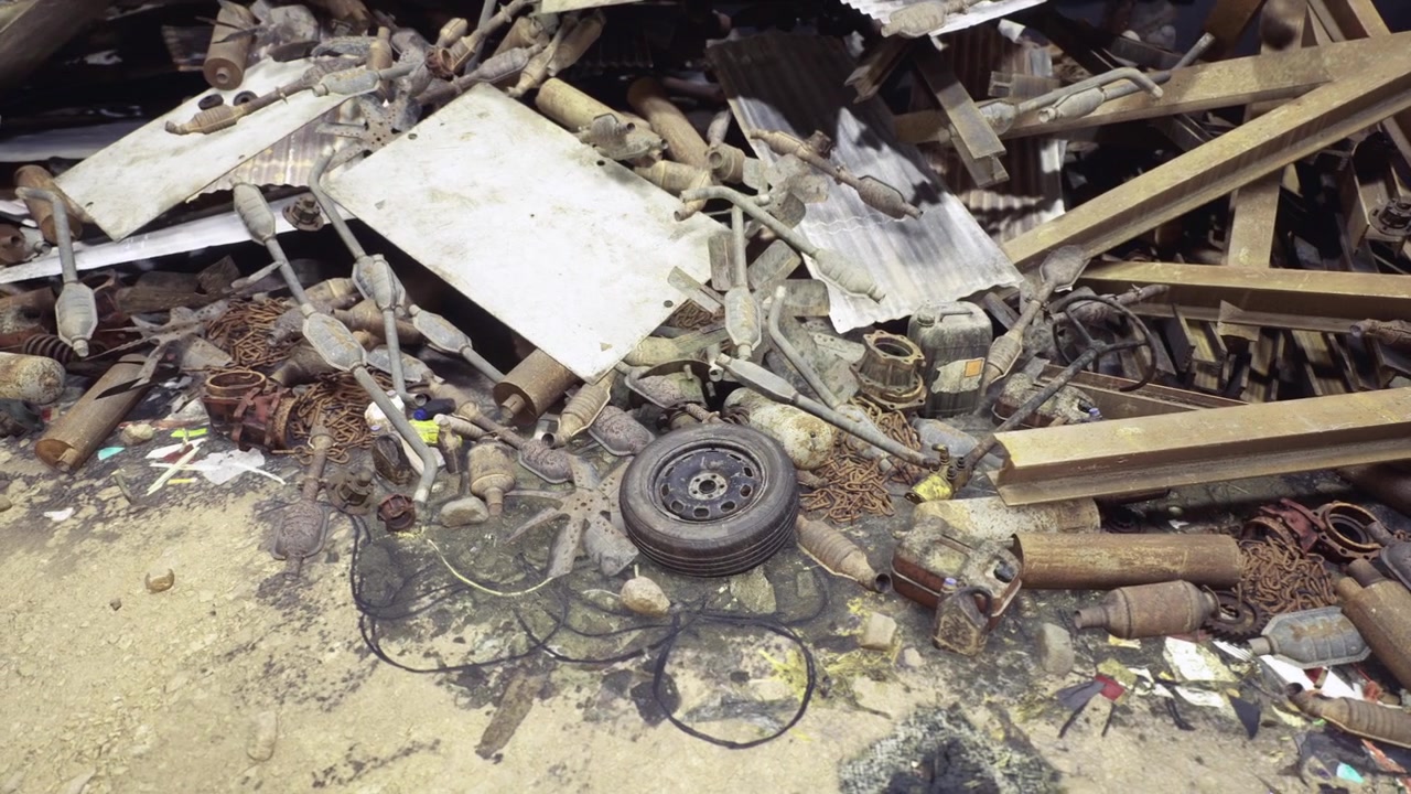 Rusty remnants tell stories of a forgotten industrial era in a bustling city