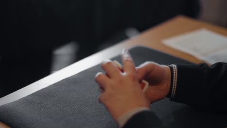 a pair of hands shows the technique how to split the deck and stack it, both one handed and with both hands