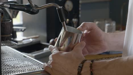 barista making coffee