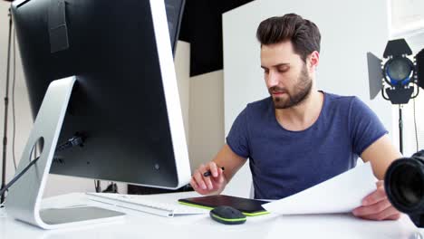 graphic designer using a graphics tablet
