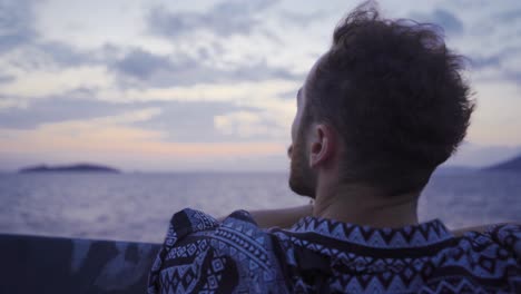 thoughtful man looking at the sea.