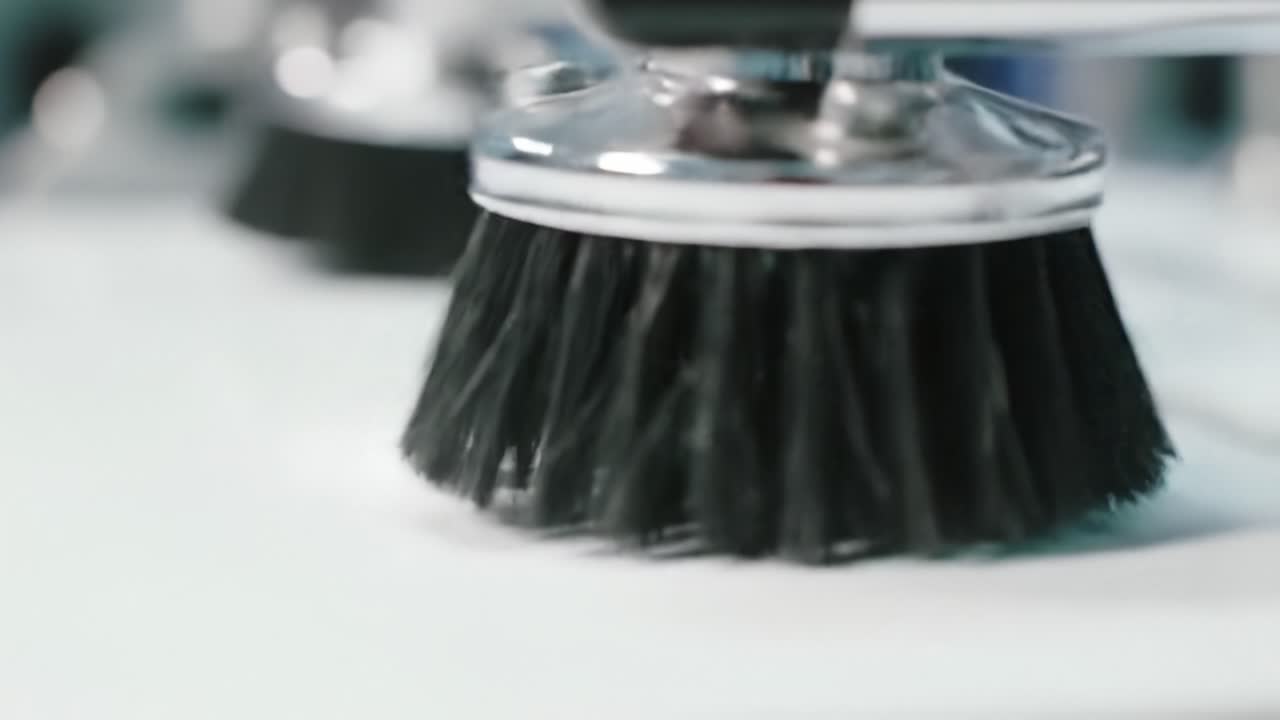 Close-Up of Specialized Brush Technology in Action, Focusing on the Fine Details and Precision of the Bristles on a Smooth Surface for Enhanced Cleaning Efficiency