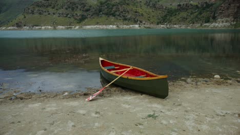 canoe on a lakeside shore