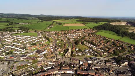 denbighshire residential suburban north wales countryside housing estate aerial view slow right pan shot