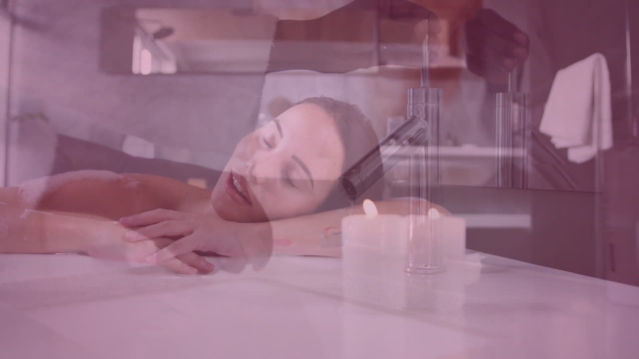 Resting on spa table, woman surrounded by candles and soothing animation ambiance