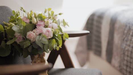 close-up of bridal bouquet on chair
