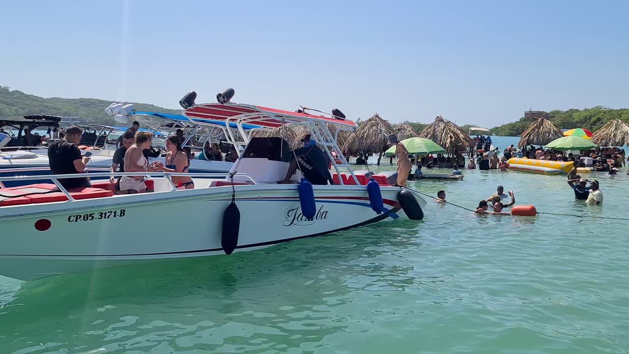 Cartagena, Colombia. People Having Fun on Cholon Party Island on Hot Sunny Day