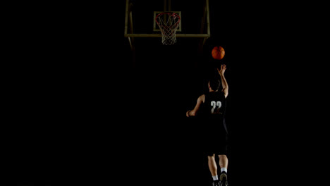 male basketball player playing in the court 4k