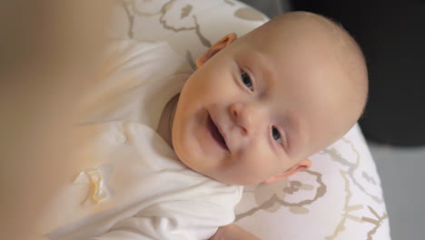 a closeup of a giggling baby girl