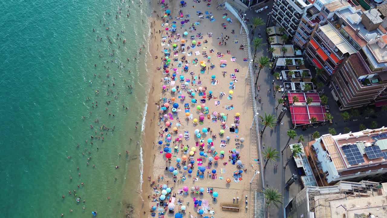 Costa Blanca Benidorm Levante beach summer holiday season holidaymakers, aerial drone Spain