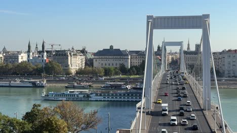 areal view of the traffic on elisabeth bridge over the river danube