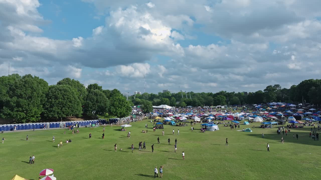 Piedmont Park Filled With People During The Free Outdoor Concert Of Jazz Festival In Atlanta, Georgia, USA. Aerial Shot