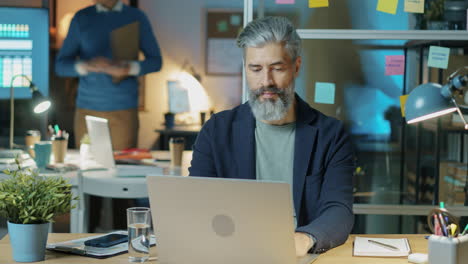 businessman working on laptop in office
