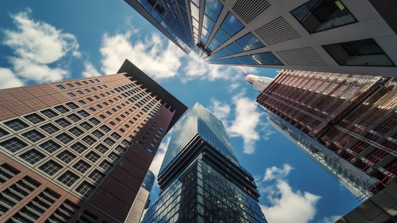 Low-Angle Timelapse Of Modern Skyscrapers In Modern Frankfurt Business City