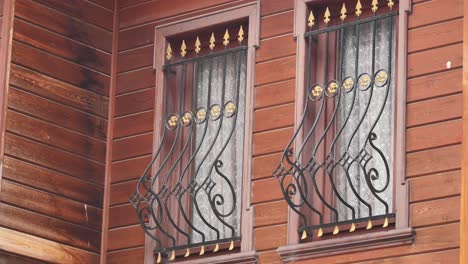ornamental windows on a wooden house