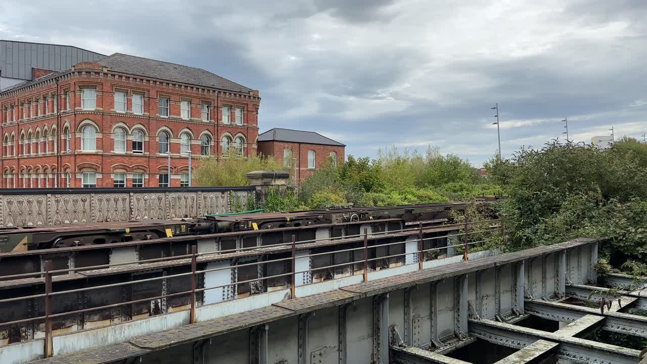 Freight cargo train leaving the station tracks in Middlesbrough north east england uk
