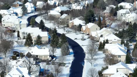 Aerial-shot-of-a-winding-neighborhood-street