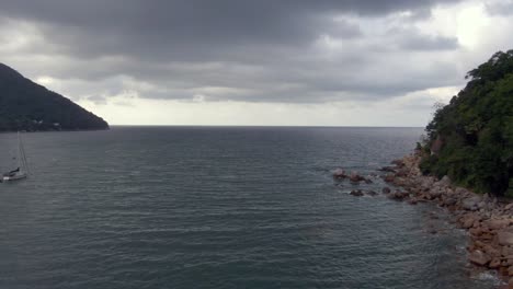 aerial view of yelapa beach on a cloudy day in jalisco, mexico - drone shot