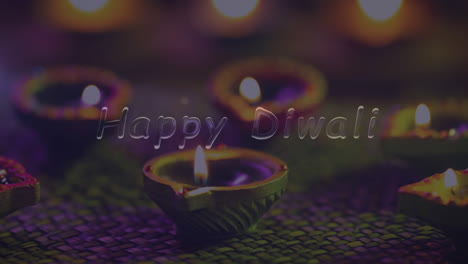 animación del feliz texto de diwali sobre las velas en diwali
