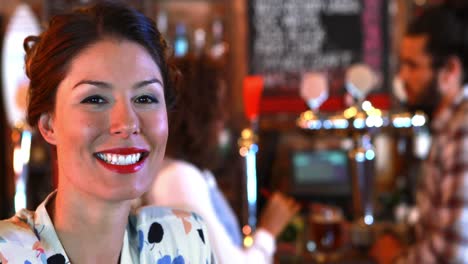 portrait of beautiful woman with hurricane cocktail