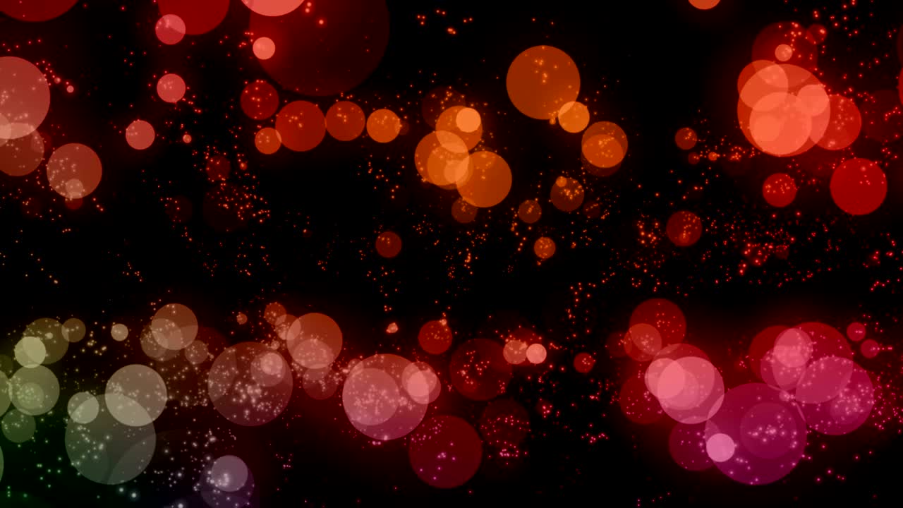 christmas digital glitter sparks multi color red and purple particles bokeh flowing on colorful background, with explosion effect, holiday festive happy new year event