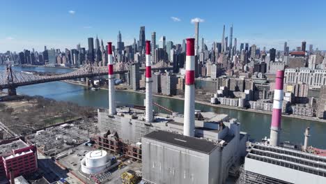 roosevelt island at manhattan in new york united states. factory chimney. beautiful cityscape. roosevelt island at new york united states. highrise buildings landscape
