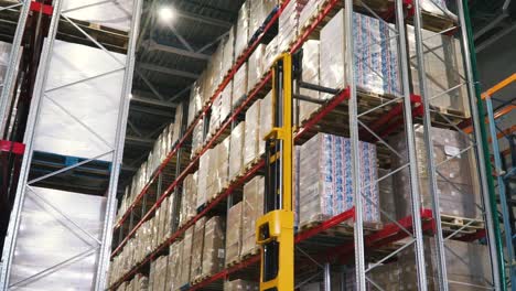 warehouse interior with high-bay rack system and forklift