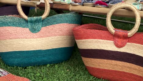 Left-Gimbal-Shot-of-Handmade-Purses-at-Flea-Market