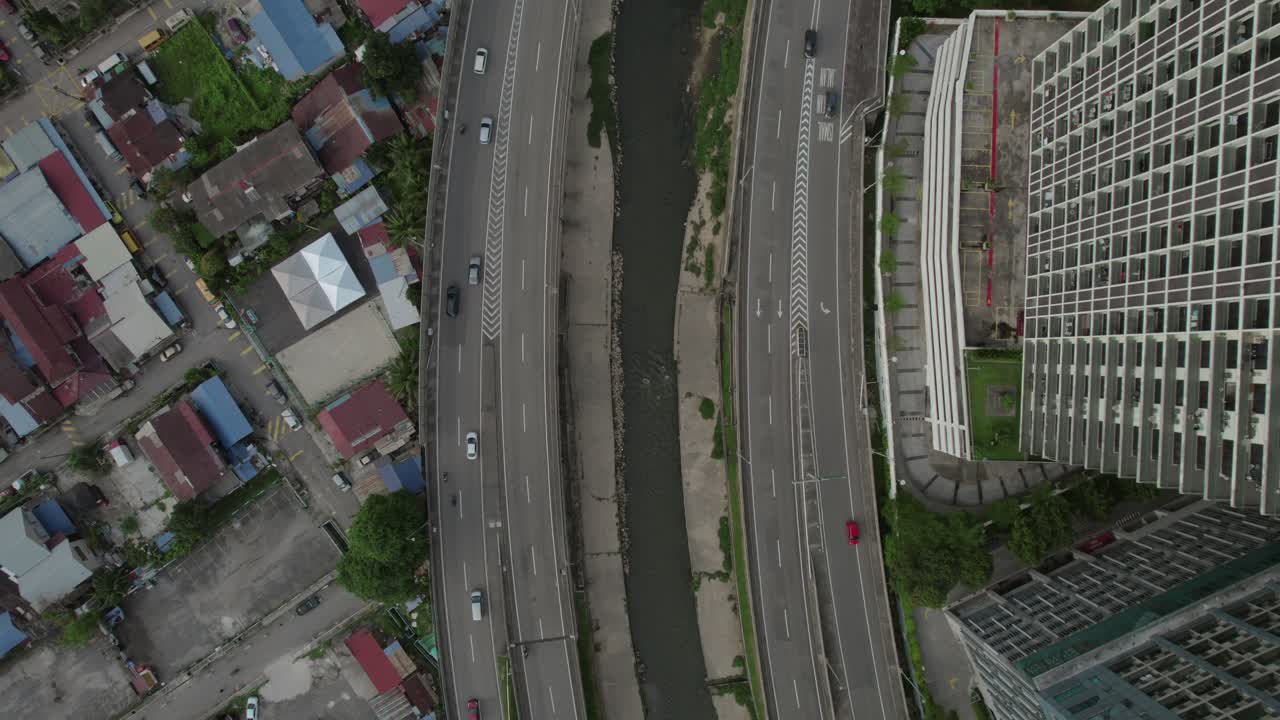 Aerial View of City with River and Highway