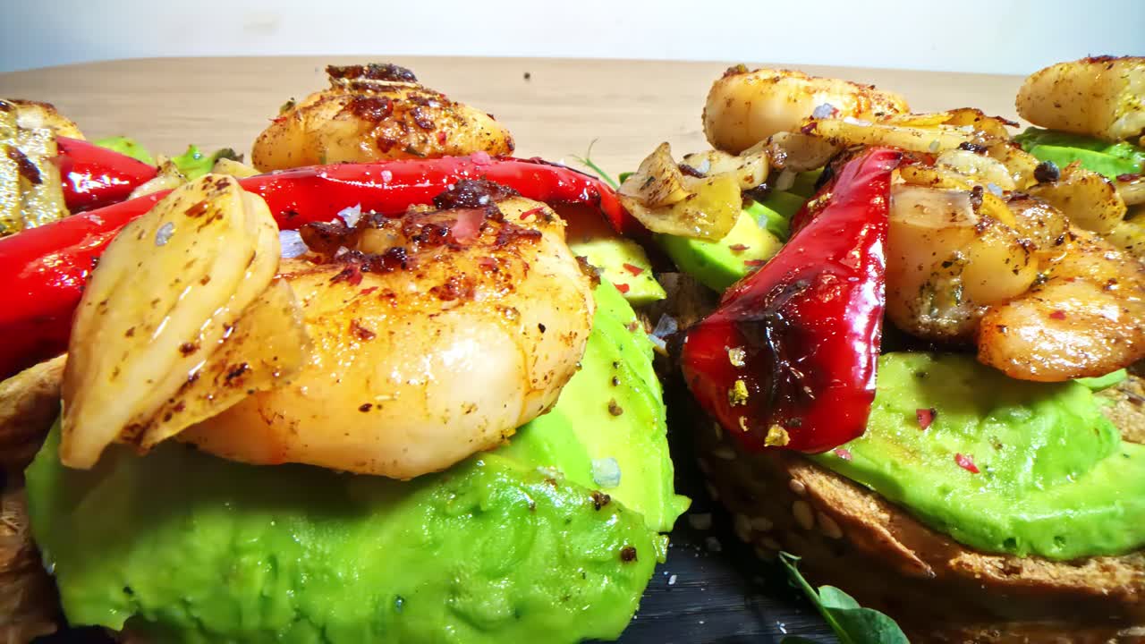 Grilled shrimp and peppers on avocado toast, vibrant and delicious meal