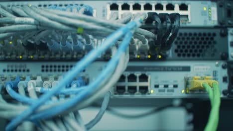 network equipment and cables in a server rack