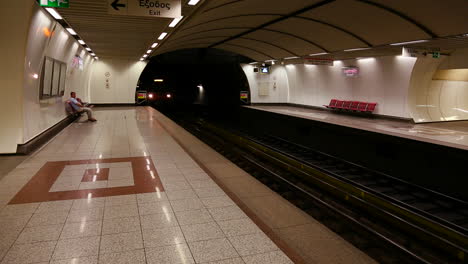 The-subway-arrives-at-an-underground-station-in-Athens-Greece