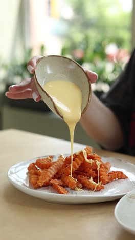 sweet potato fries with cheese sauce