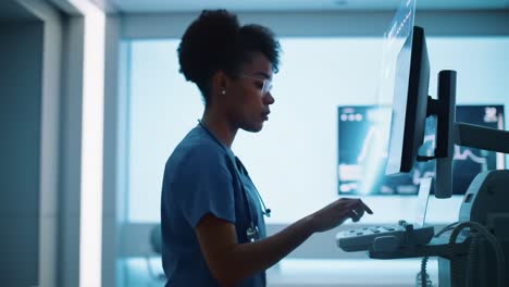 a healthcare professional engaged in operating advanced medical equipment, demonstrating meticulous attention to detail while interacting with diagnostic imaging technology in a clinical setting