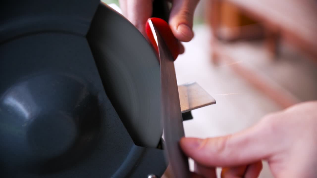 Sharpening a Knife on a Grinder