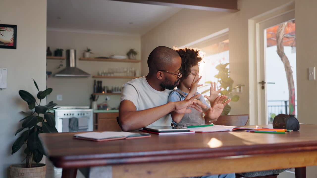 Father and Child Drawing Together at Home